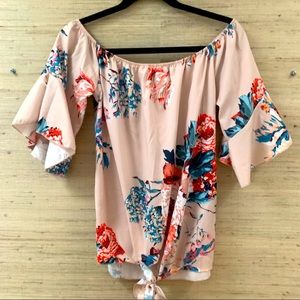 New,Floral Top that ties at the bottom.